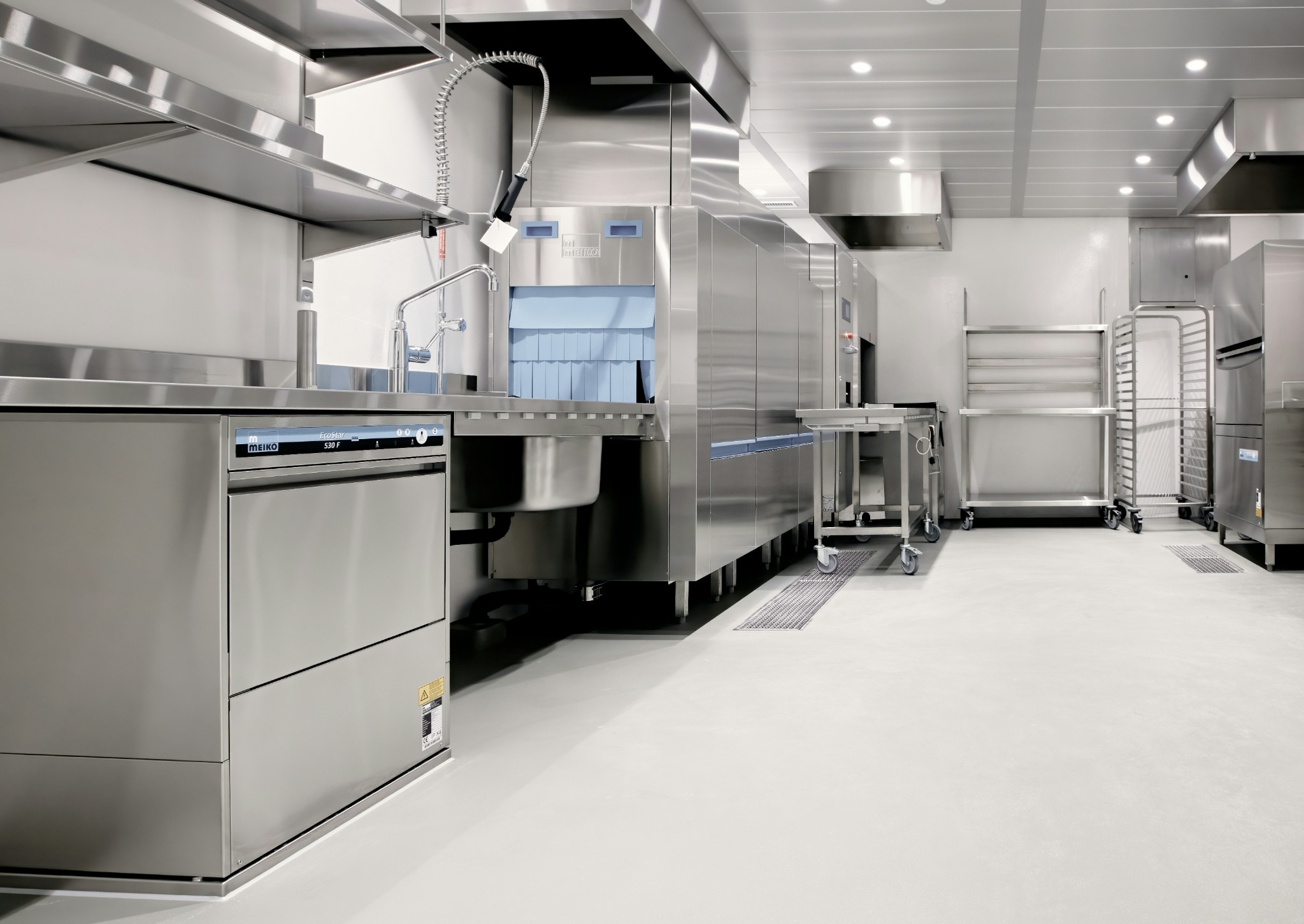 Clean commercial kitchen with coated surfaces