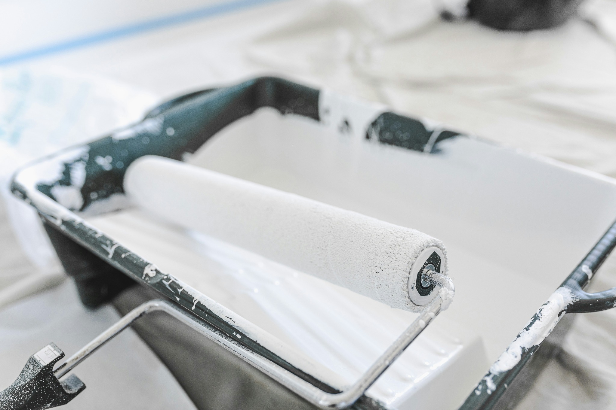 Paint roller and tray ready for application